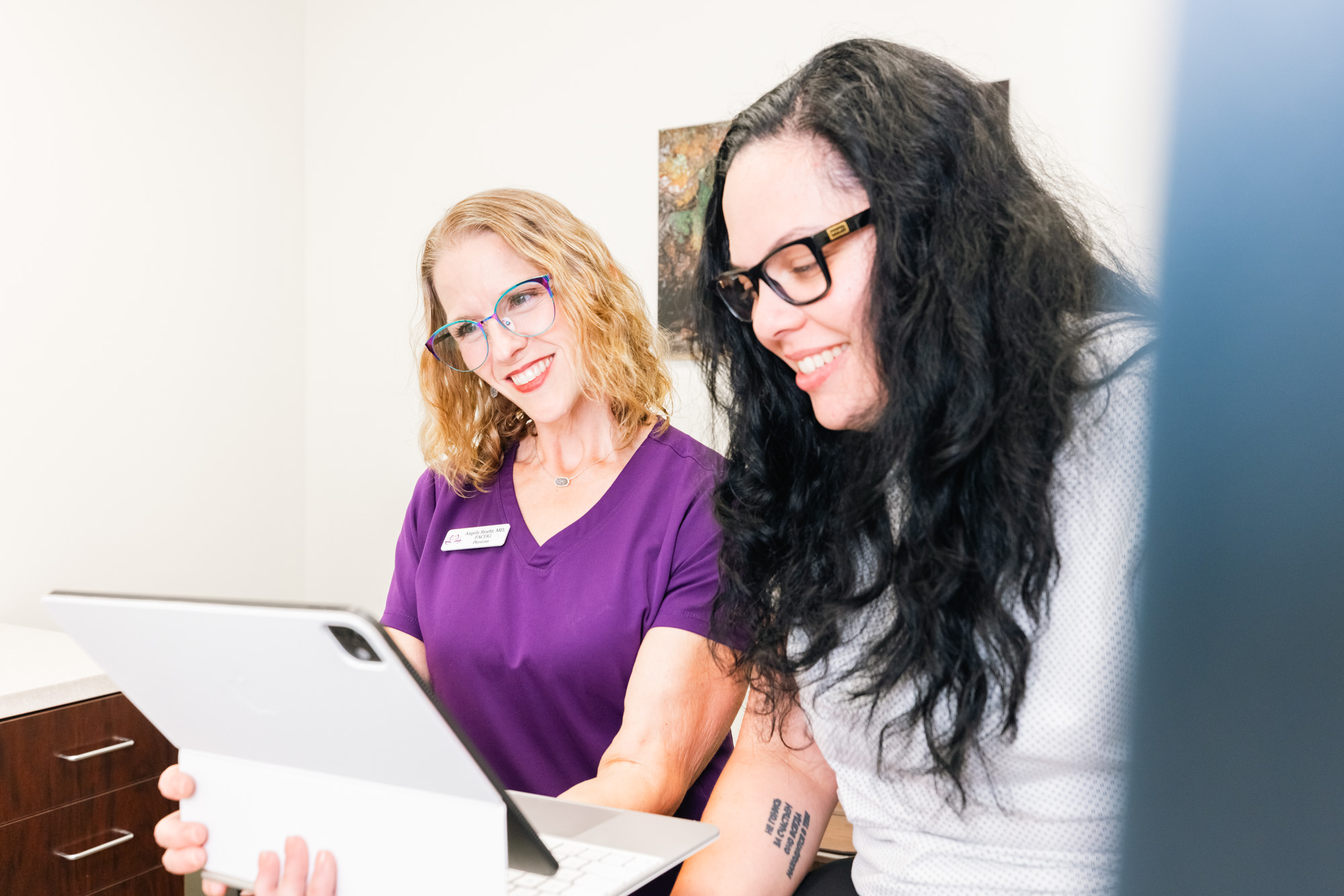 A patient meets with Dr. Stoehr, a functional medicine doctor near Plano, for personalized nutrition coaching.